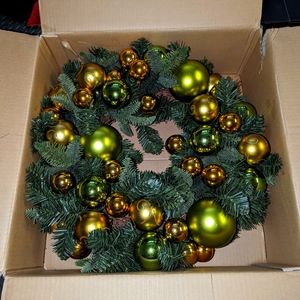 Christmas wreath by pottery Barn with green and gold Christmas balls